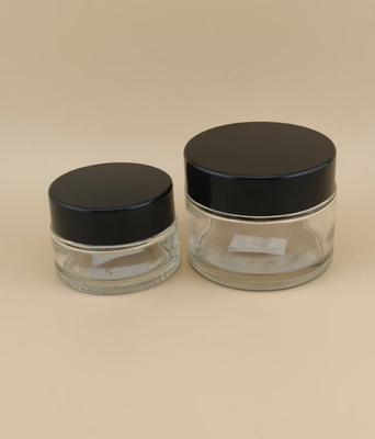 طراحي خوب شیشه هاي شفاف قوطي خامه اي با پوشش پیچ دار براي لوشن
