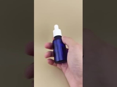 طراحی ظریف، شفاف، آبی تیره، صاف، بطری قطره چکان گرد برای مراقبت از پوست