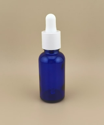 طراحی ظریف، شفاف، آبی تیره، صاف، بطری قطره چکان گرد برای مراقبت از پوست