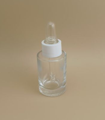 بطری قطره چکان مینی شیشه‌ای مناسب برای کاربردهای مراقبت از پوست، تضمین کننده سهولت استفاده و توزیع دقیق برای مراقبت از پوست بانوان