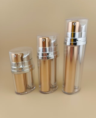 بطری پمپ بدون هوا دو رنگ طلایی و نقره ای با پوشش بیرونی برای محصولات آرایشی و مراقبت از پوست