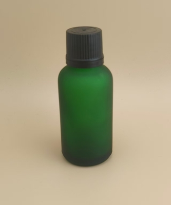 طراحي ظريف بطري شيشه اي شفاف سبز تيره براي جوهر